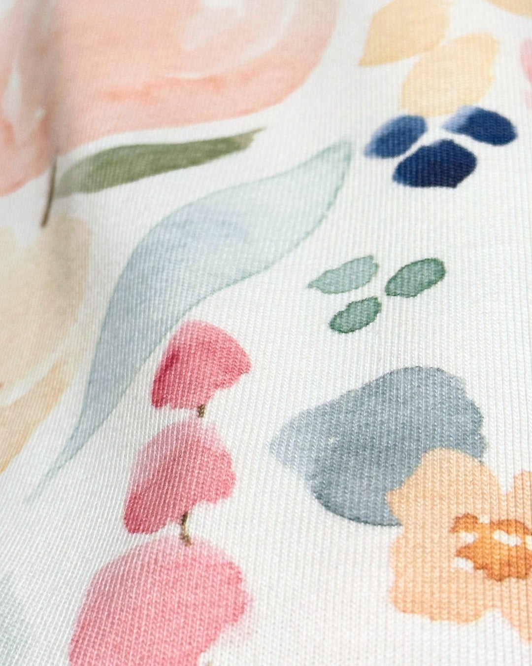 White t-shirt close up of fabric and print
