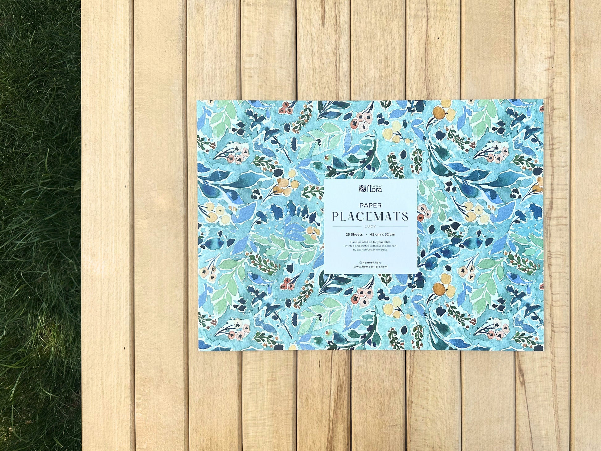 Disposable paper placemats with floral print for dining tables, parties, and outdoor gatherings